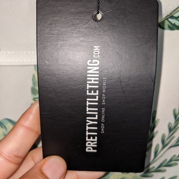 PrettyLittleThing Green Leaves Print Asymmetrical Mini Skirt UK 16 US 12 - Picture 7 of 12